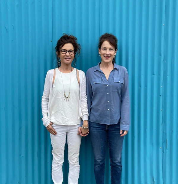 Two women out together, each carrying a Birdie 3.0